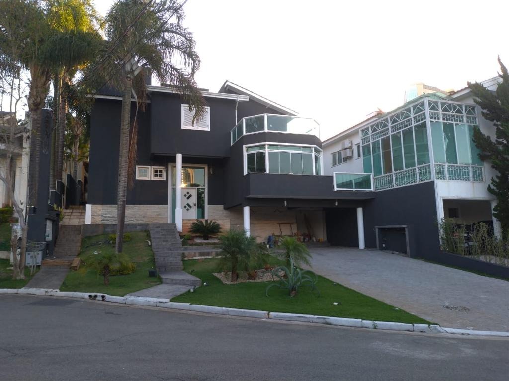 Casa de Condomínio à venda e aluguel com 4 quartos, 450m² - Foto 1