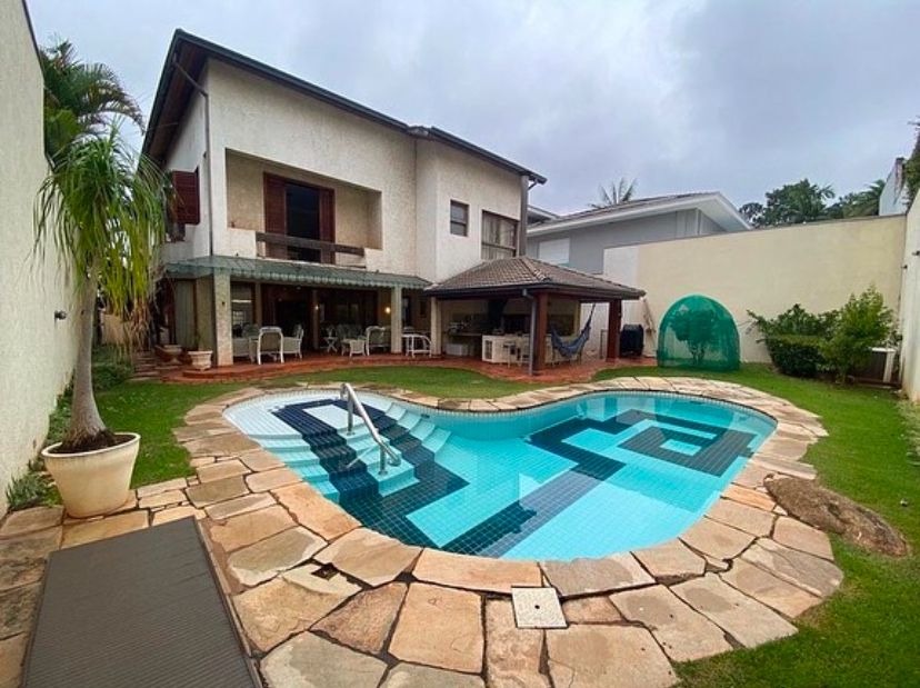 Casa de Condomínio à venda e aluguel com 4 quartos, 550m² - Foto 1