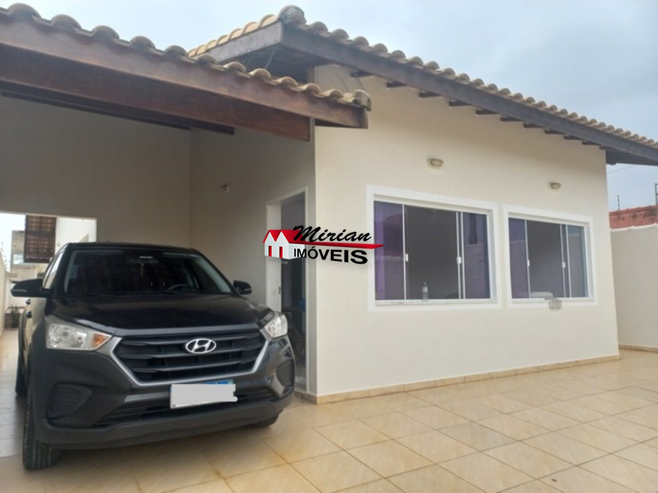 Casa à venda com 3 quartos, 125m² - Foto 1