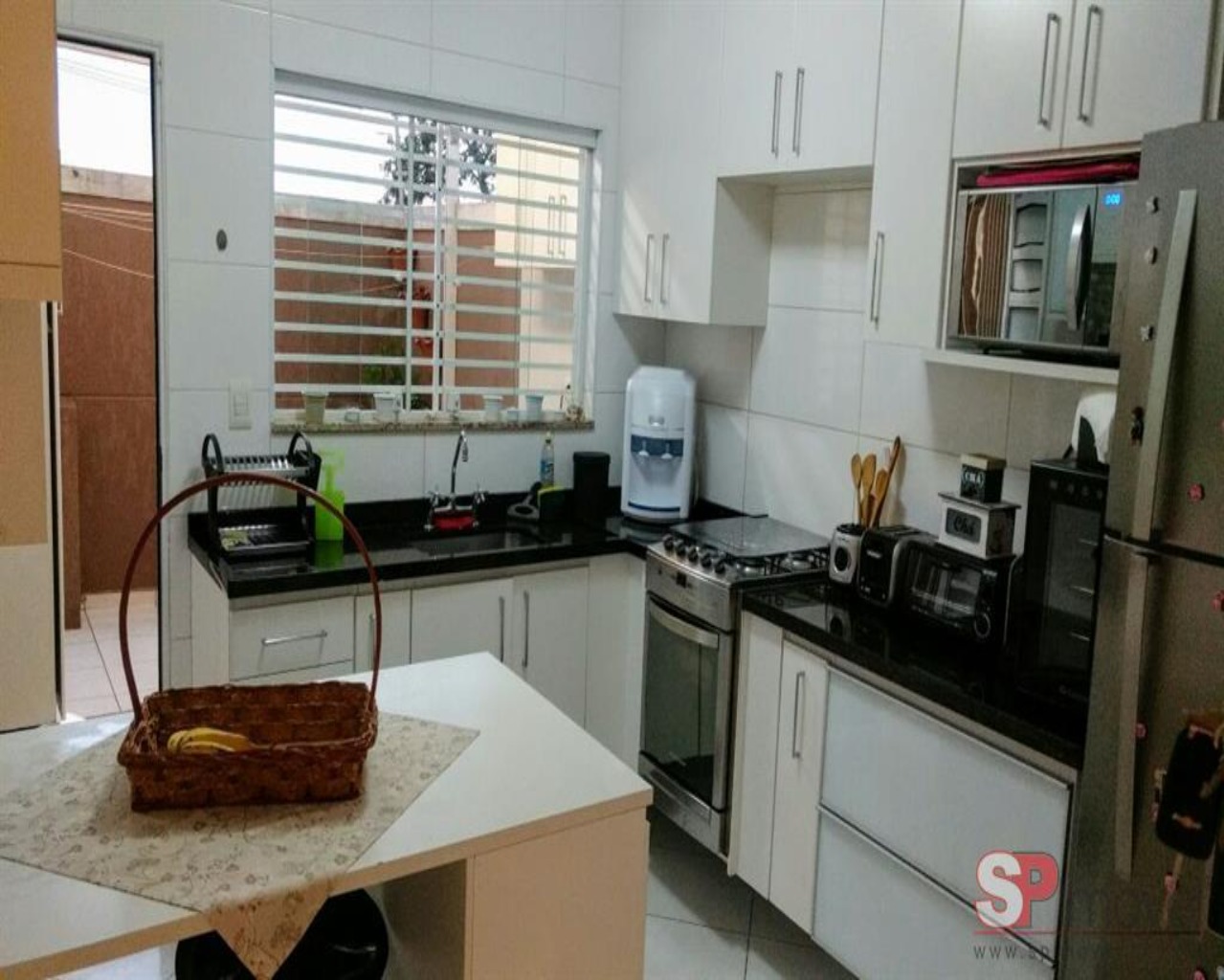 Sobrado à venda com 3 quartos, 132m² - Foto 1