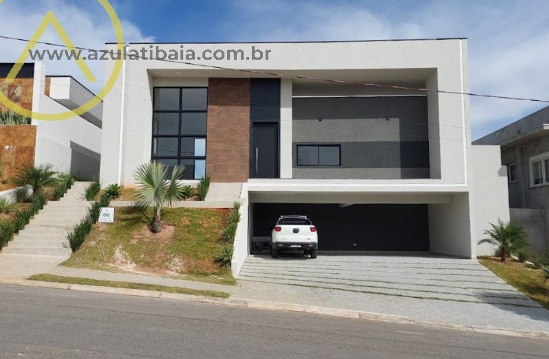 Esta casa oferece um design moderno e espaçoso, com 3 suítes