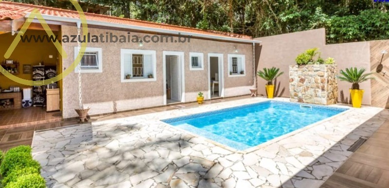 Esta encantadora residência está disponível para venda, Atibaia.