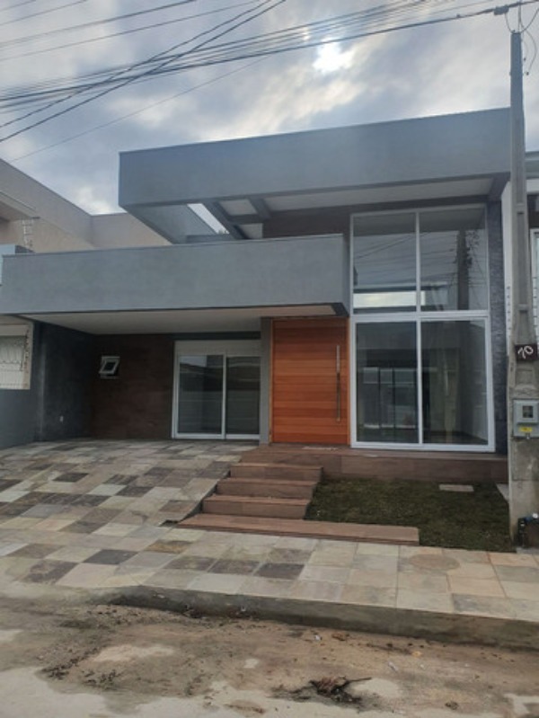 Casa à venda com 3 quartos, 138m² - Foto 1