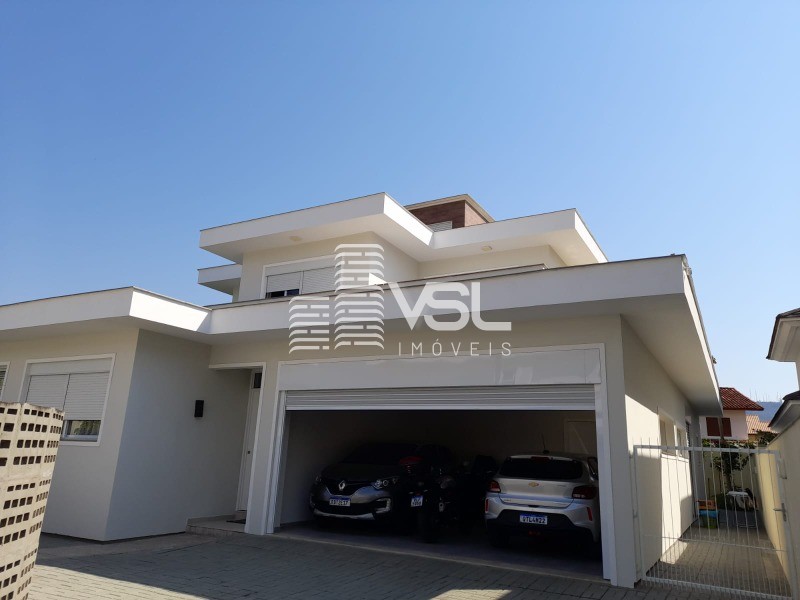 Casa com 4 dormitórios sendo 1 suíte com hidromassagem, garagem 2 carros