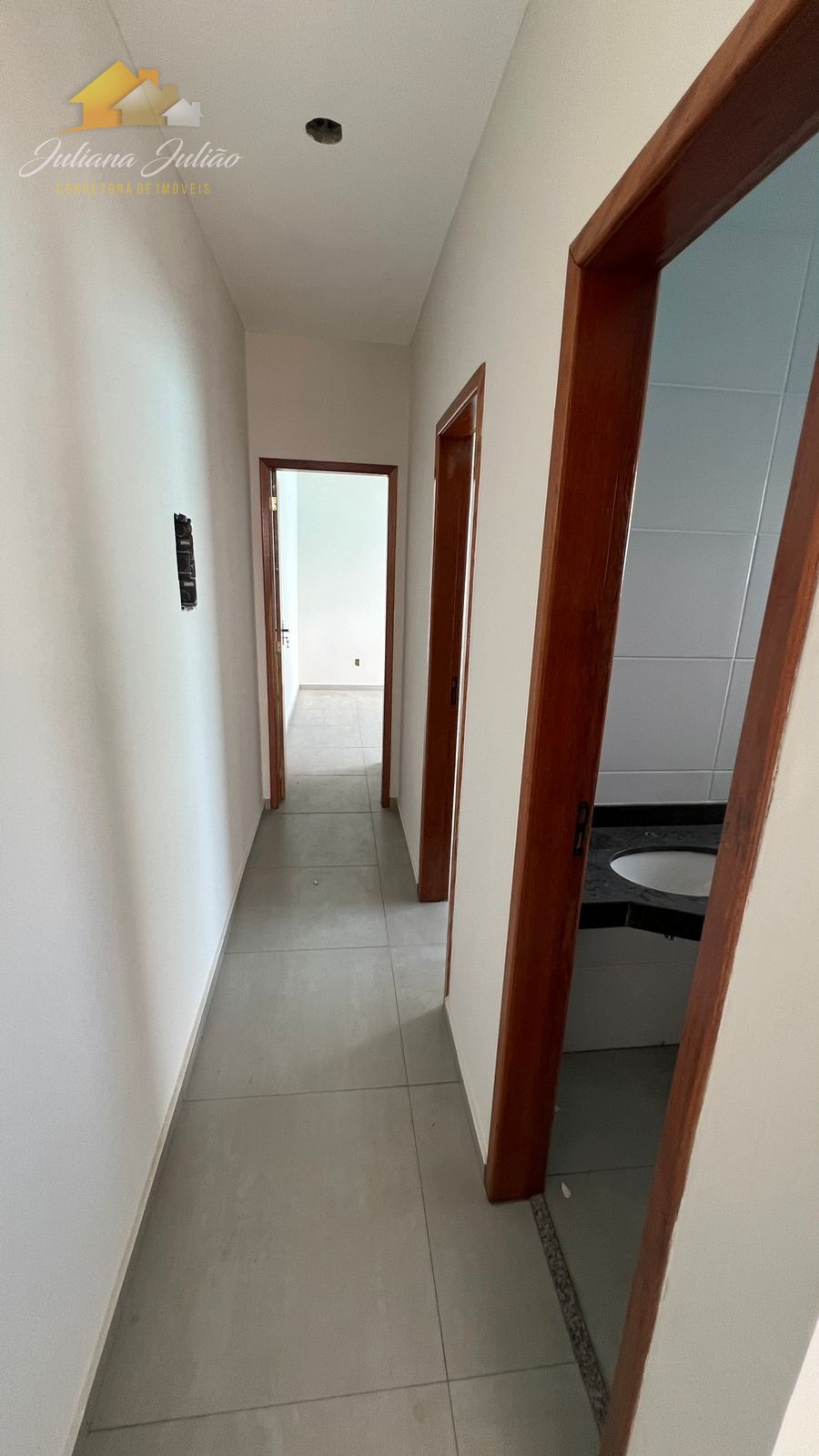 Casa à venda com 3 quartos, 70m² - Foto 11