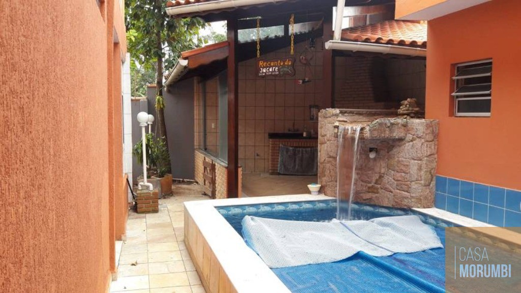 Casa à venda com 3 quartos, 288m² - Foto 1