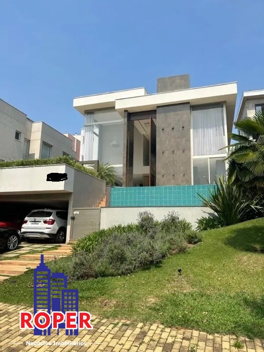 Casa para alugar com 4 quartos, 390m² - Foto 1