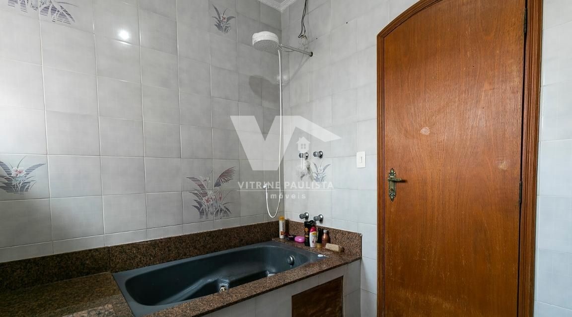 Casa à venda com 5 quartos, 182m² - Foto 16