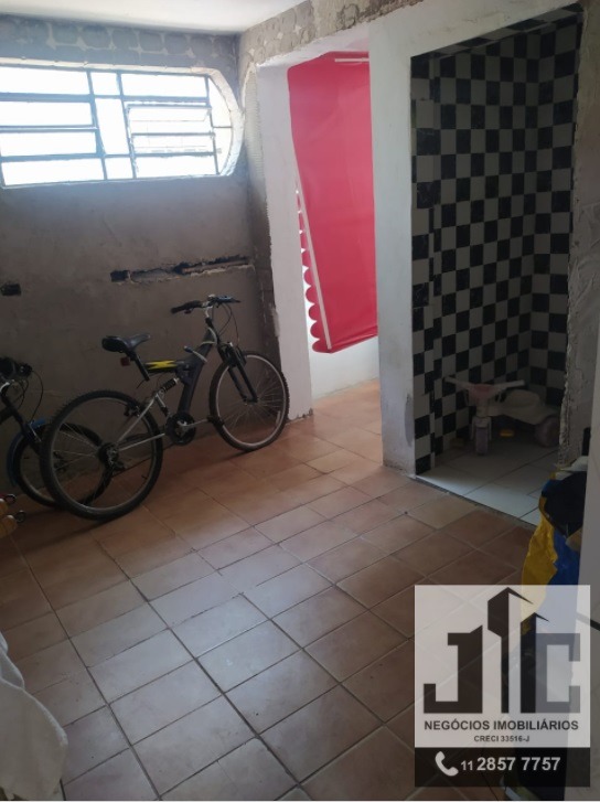 Casa à venda com 3 quartos, 100m² - Foto 4