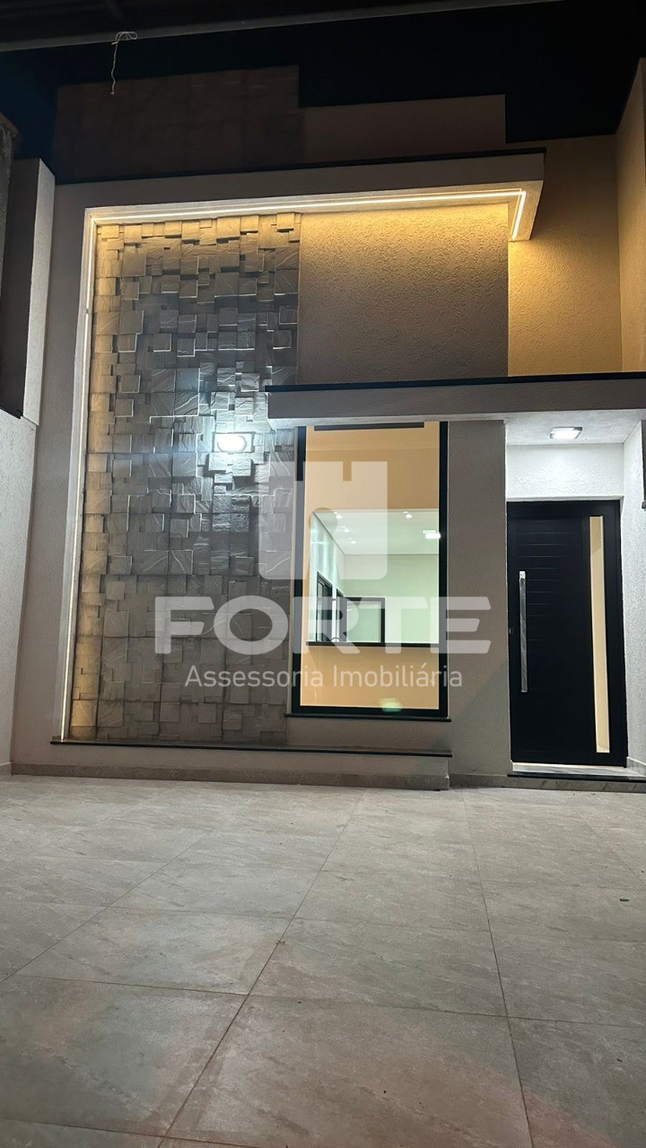 Casa à venda com 3 quartos, 100m² - Foto 1