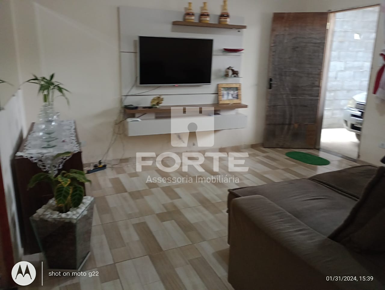 Casa à venda com 3 quartos, 100m² - Foto 1