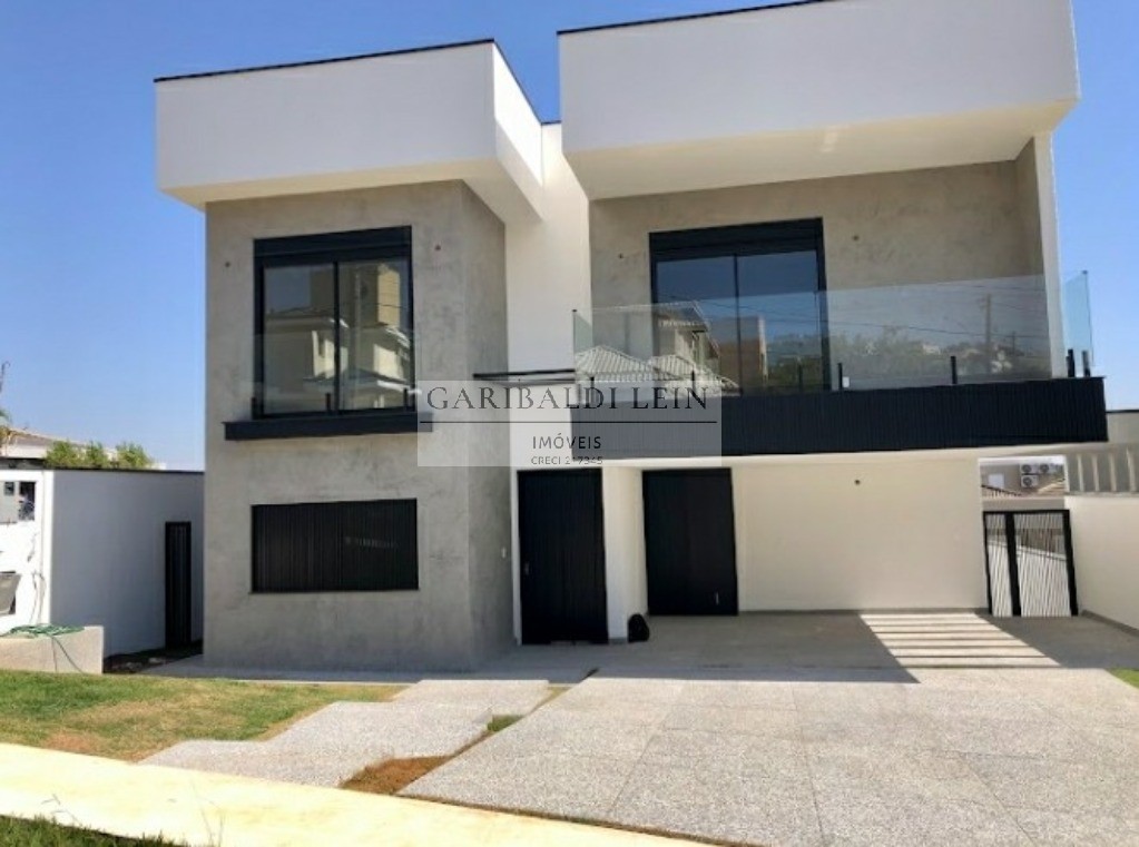 Casa à venda com 4 quartos, 342m² - Foto 1