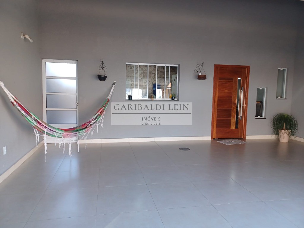 Casa à venda com 3 quartos, 125m² - Foto 1