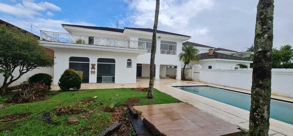 Casa de 5 suítes com piscina no Condomínio Jardim Acapulco na Praia de Pernambuco - Guarujá